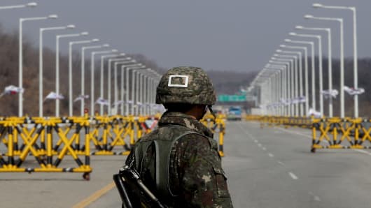 A South Korean soldier stands at a military check point connecting South and North Korea at the Unification Bridge in Paju, South Korea.
